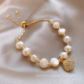 Shangjie OEM Pulseras Pulseras de ópalo ajustable Cáscaras de concha de la moda Joya de perla natural coreana pulsera de perla coreana